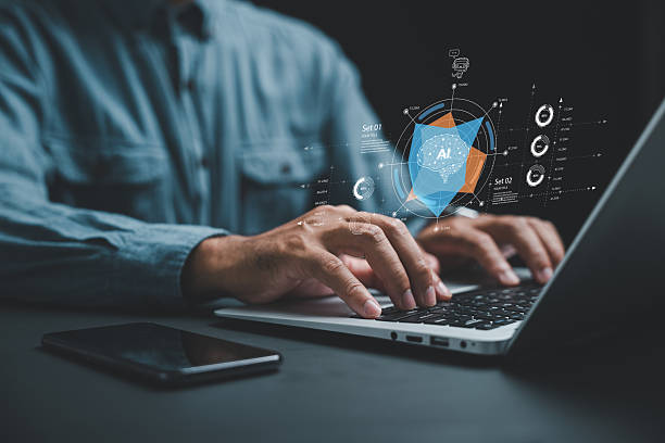 Profissional utilizando computador com elementos gráficos de IA ao redor, representando a integração entre tecnologia e trabalho humano. Profissional utilizando computador com elementos gráficos de IA ao redor, representando a integração entre tecnologia e trabalho humano.