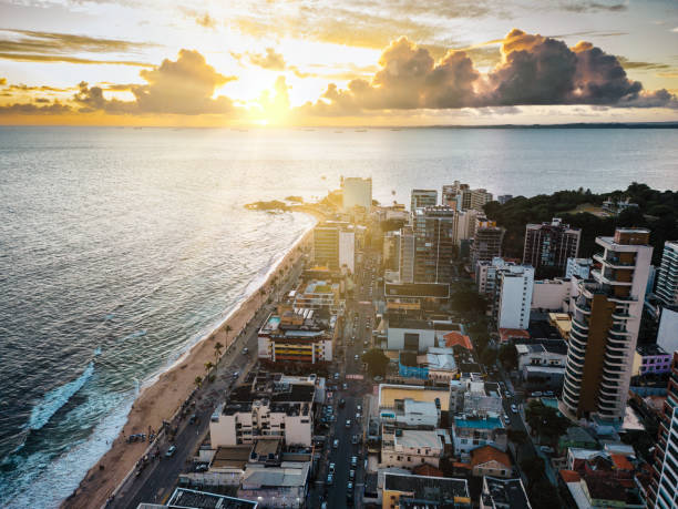 aerial view on coastline and skyline of Salvador da Bahia at sunset Vista panorâmica de Salvador com praias, casarões coloridos e elementos da cultura local ao pôr do sol
